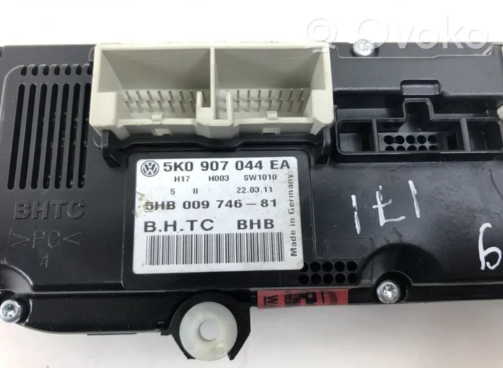 Volkswagen PASSAT B7 Panel klimatyzacji 5HB00974681