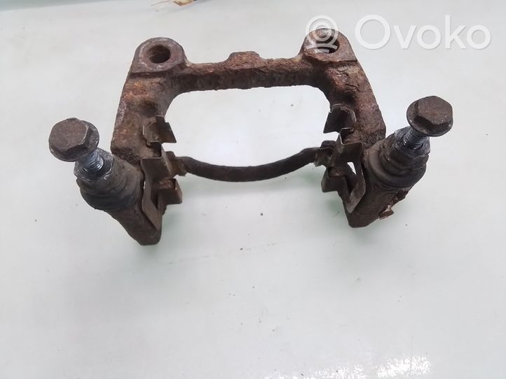 Volkswagen Touran I Brake caliper pad carrier rear 