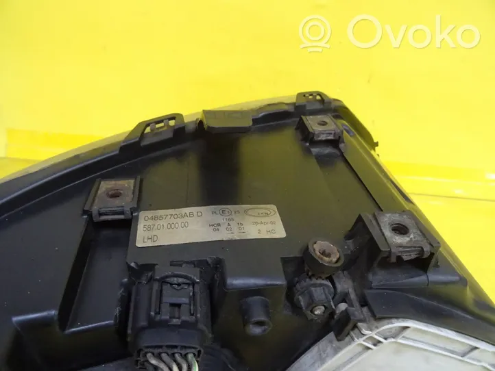 Chrysler Voyager Lampa przednia 04857703AB