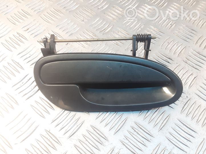 Opel Omega B2 Front door exterior handle 105