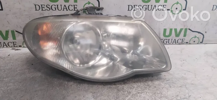 Chrysler Voyager Lampa przednia 04857830AB