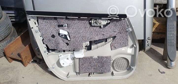 Nissan Leaf I (ZE0) Rivestimento del pannello della portiera anteriore 