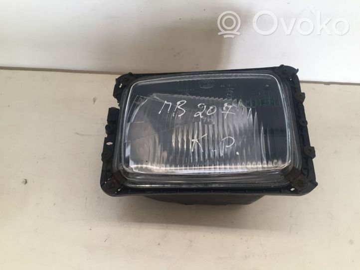 Mercedes-Benz 207 310 Lampa przednia 12130100