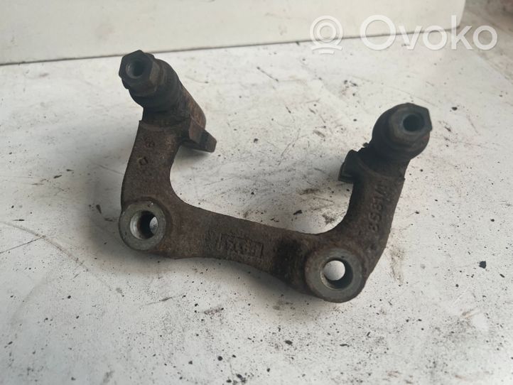 Volkswagen Golf V Supporto della pinza del freno posteriore 1K0615425P