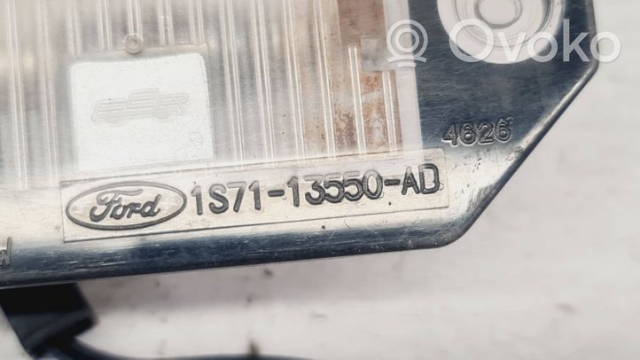 Ford Mondeo Mk III Lampa oświetlenia tylnej tablicy rejestracyjnej 1S7113550AD