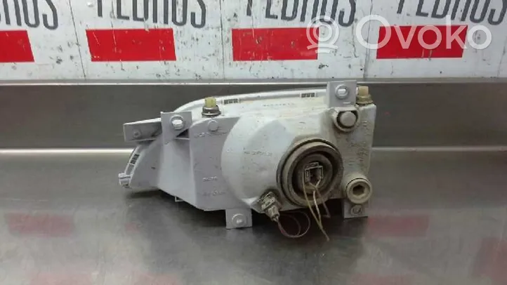 Ford Orion Lampa przednia 02584811