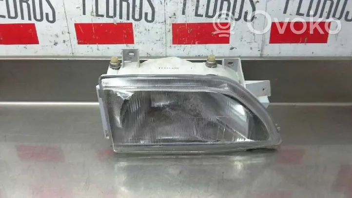 Ford Orion Lampa przednia 02584811