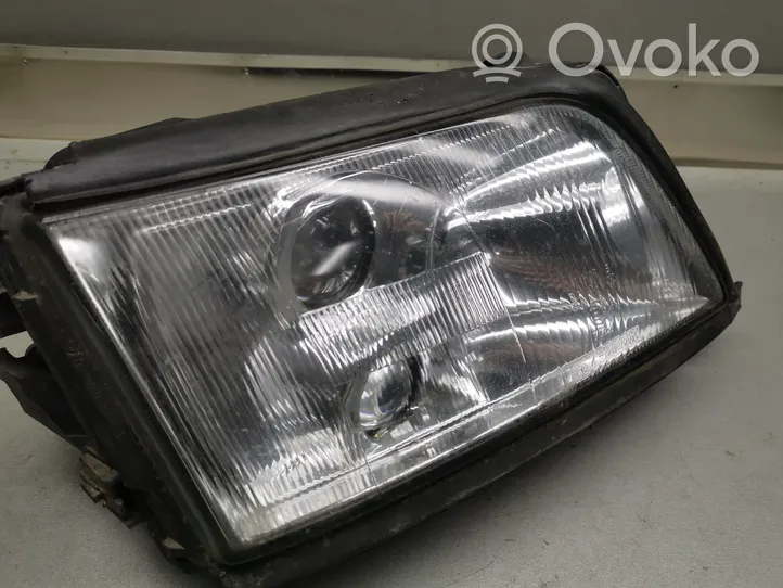 Audi A6 S6 C4 4A Lampa przednia 205003B