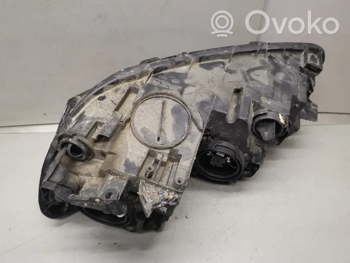 Volkswagen PASSAT B7 USA Lampa przednia 561941006A