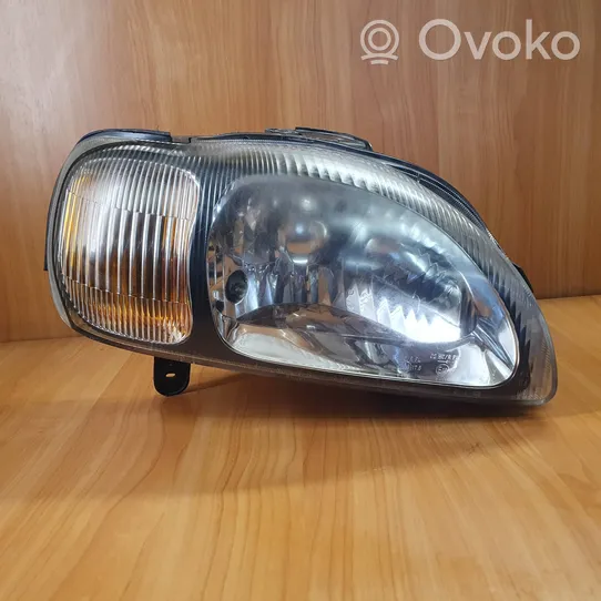 Suzuki Baleno EG Priekšējais lukturis 10032617