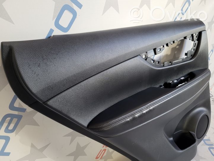 Nissan Rogue Rivestimento del pannello della portiera posteriore 829014BA0A