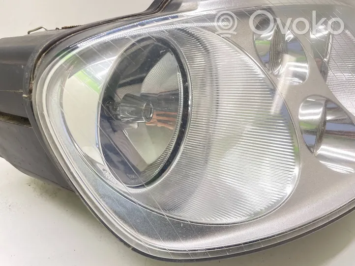 Volkswagen Touran I Lampa przednia 1T0941006E