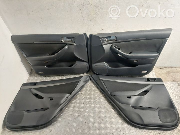 Toyota Avensis T250 Boczki / Tapicerka drzwi / Komplet 6761005460B0