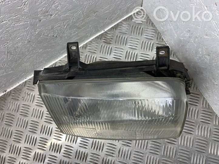 Volkswagen Multivan T4 Lampa przednia 701941010