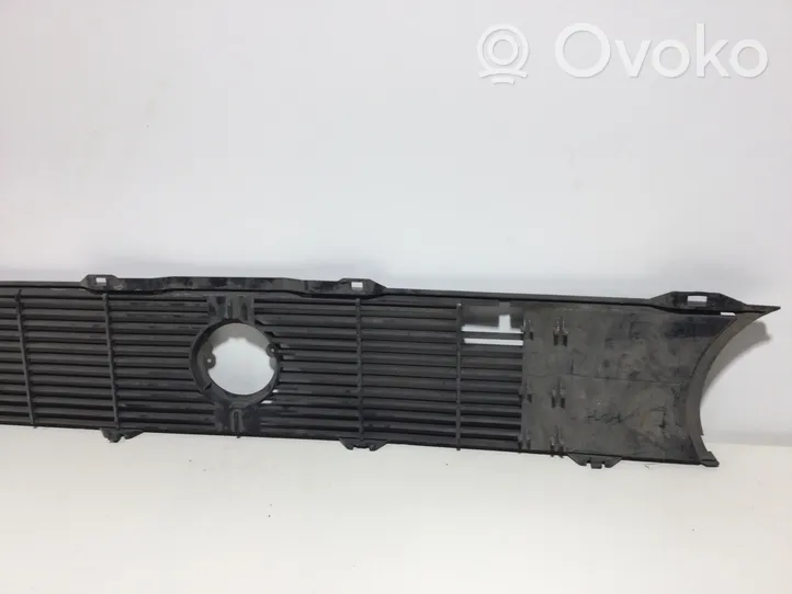 Volkswagen Golf I Front bumper upper radiator grill 171853653L