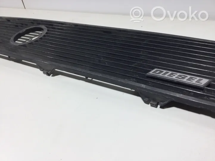 Volkswagen Golf I Front bumper upper radiator grill 171853653L