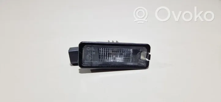 Volkswagen Polo V 6R Lampa oświetlenia tylnej tablicy rejestracyjnej 1K8943021