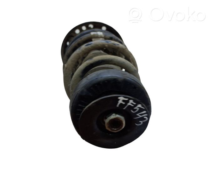 Opel Zafira C Front shock absorber with coil spring 13354037