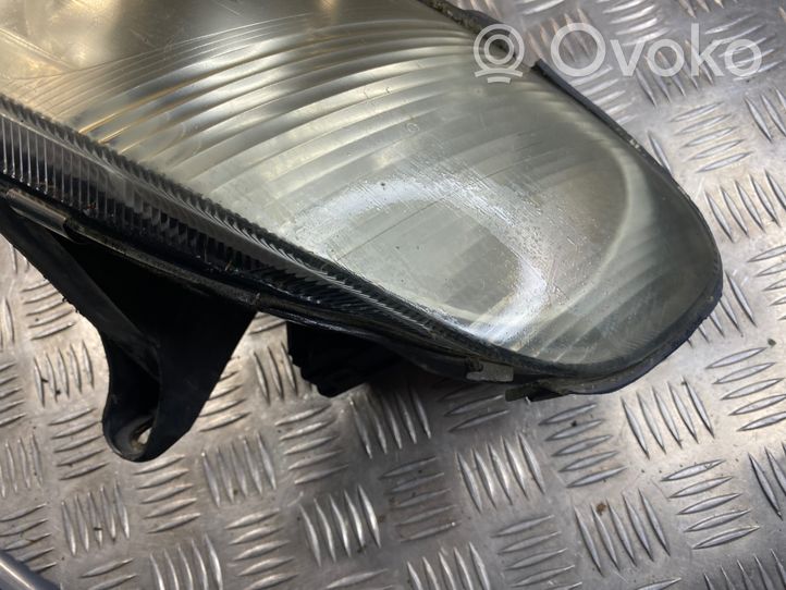 Opel Omega B1 Lampa przednia 084421119L