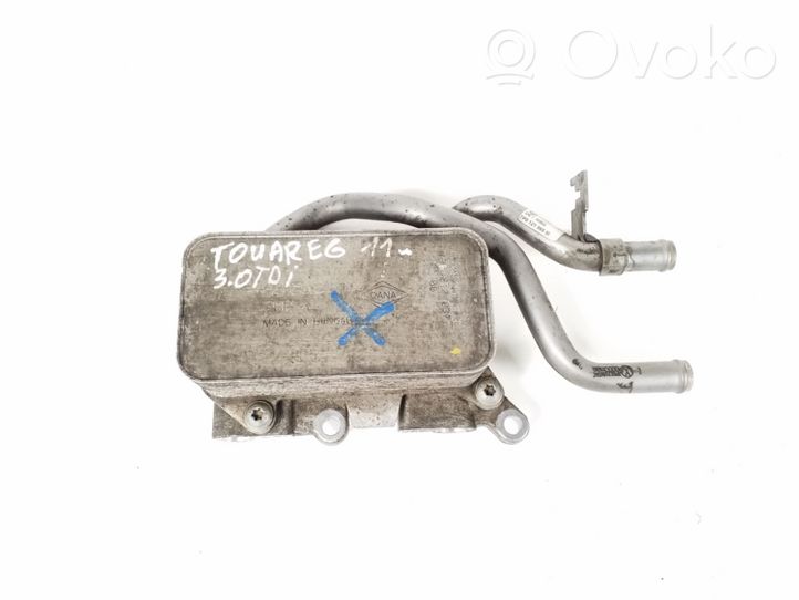 Volkswagen Touareg II Supporto di montaggio del filtro dell’olio 7P0317037