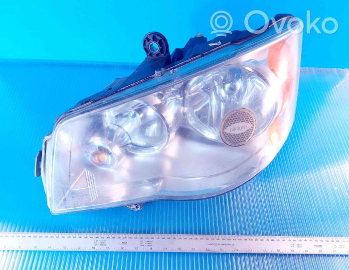 Chrysler Voyager Lampa przednia 05113345AD