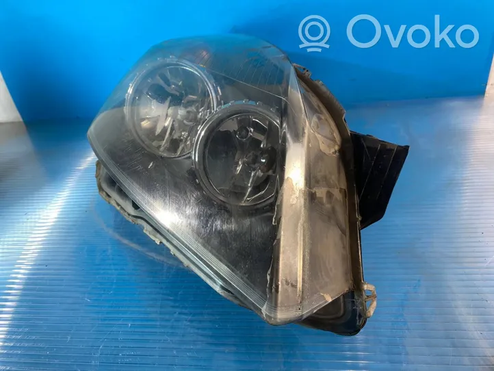 Opel Astra H Lampa przednia 