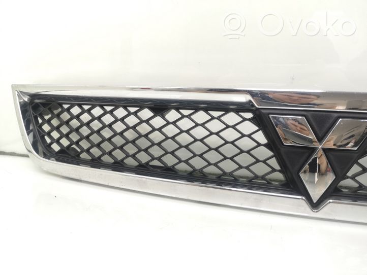 Mitsubishi Lancer X Maskownica / Grill / Atrapa górna chłodnicy 7450A093