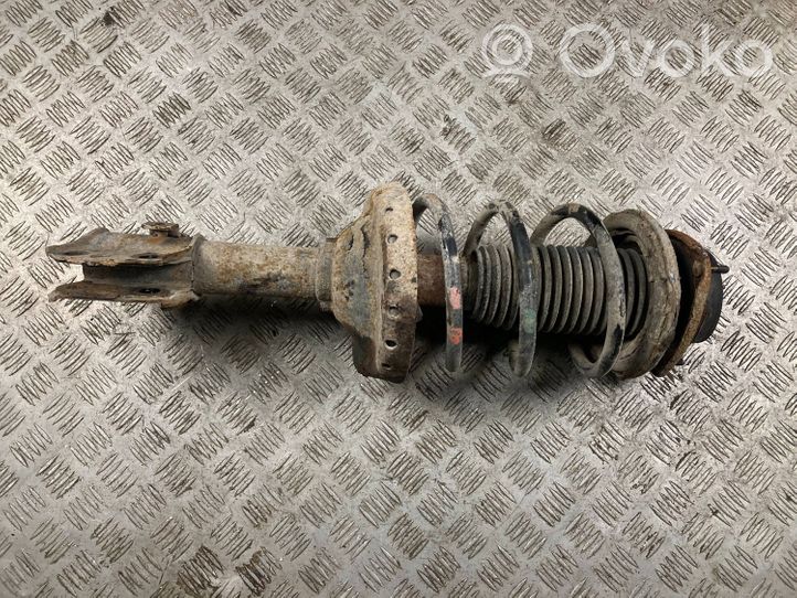 Subaru Forester SG Front shock absorber with coil spring 
