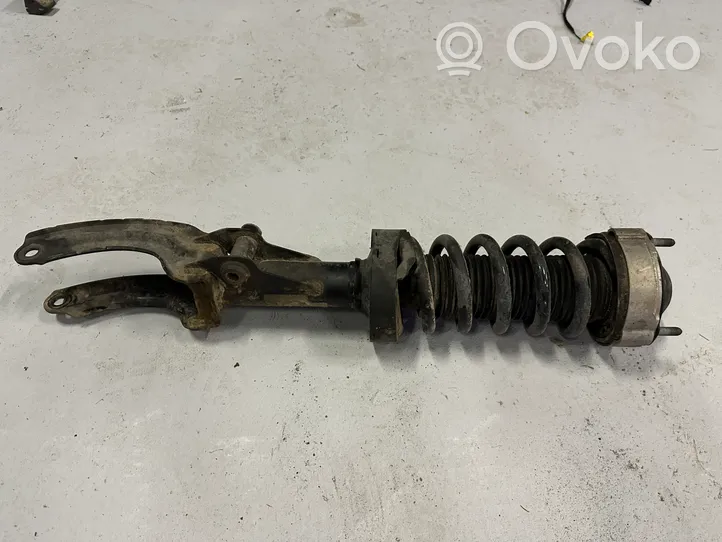 Volkswagen Touareg II Front shock absorber with coil spring 7P6413031