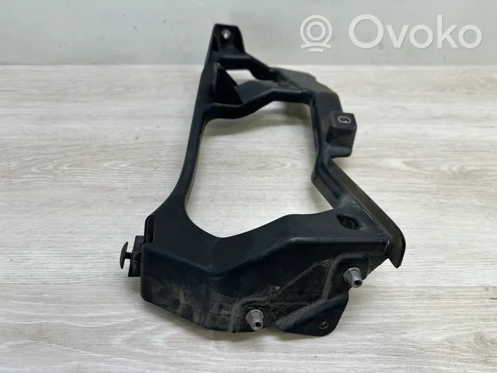 Volkswagen Touareg II Uchwyt / Mocowanie lampy przedniej 7P6806510