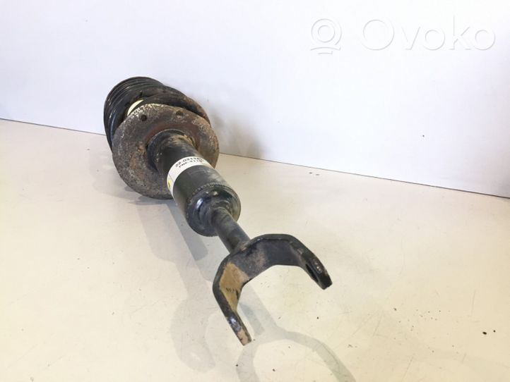 Audi A4 S4 B5 8D Front shock absorber with coil spring 22031167