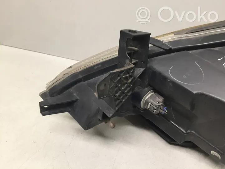 Mitsubishi Grandis Lampa przednia 10087642