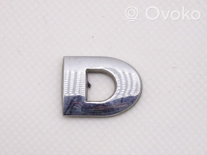 Volkswagen Golf V Mostrina con logo/emblema della casa automobilistica 