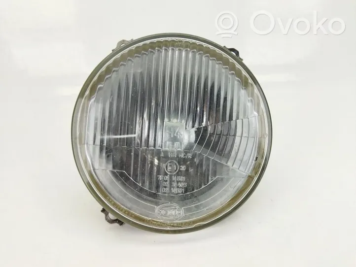 Volkswagen Golf II Lampa przednia 7R0114551