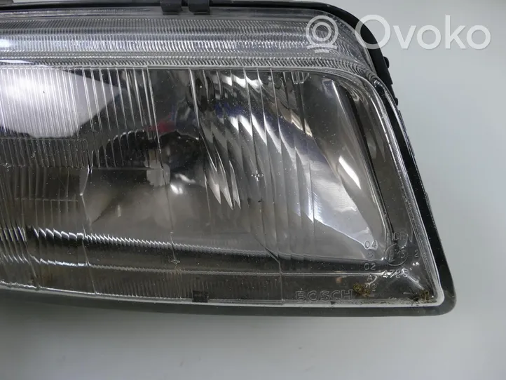 Audi A4 S4 B5 8D Lampa przednia 8D0941004E