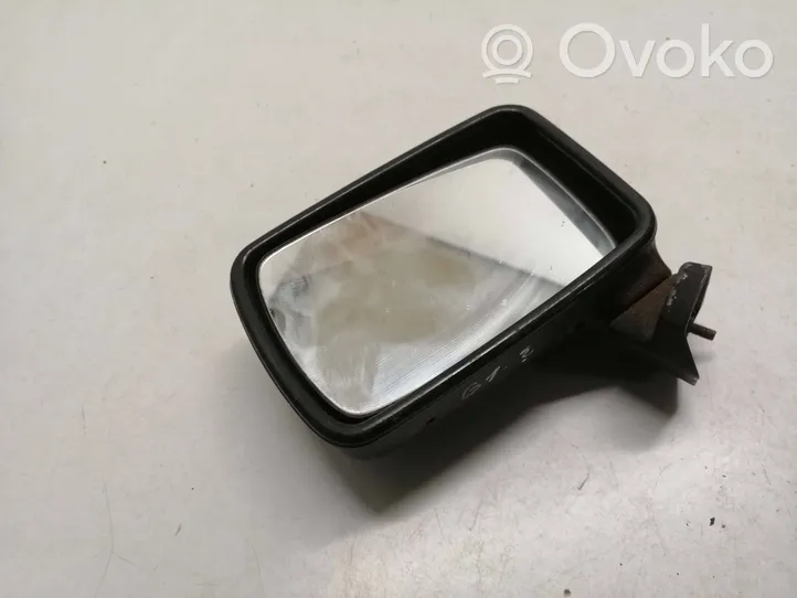 Volkswagen Golf I Manual wing mirror E1011712