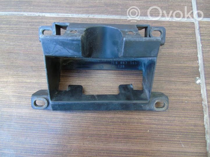 Volkswagen Touareg I Support de buse de lave-phares 7L6807361