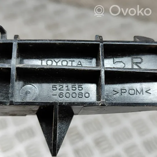 Toyota Land Cruiser (J150) Uchwyt / Mocowanie zderzaka tylnego 5215560080