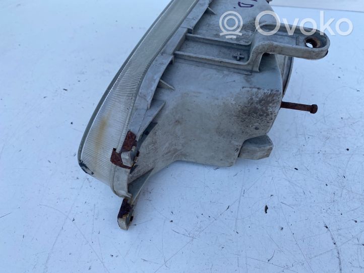 Toyota Corolla E90 Lampa przednia 2121140