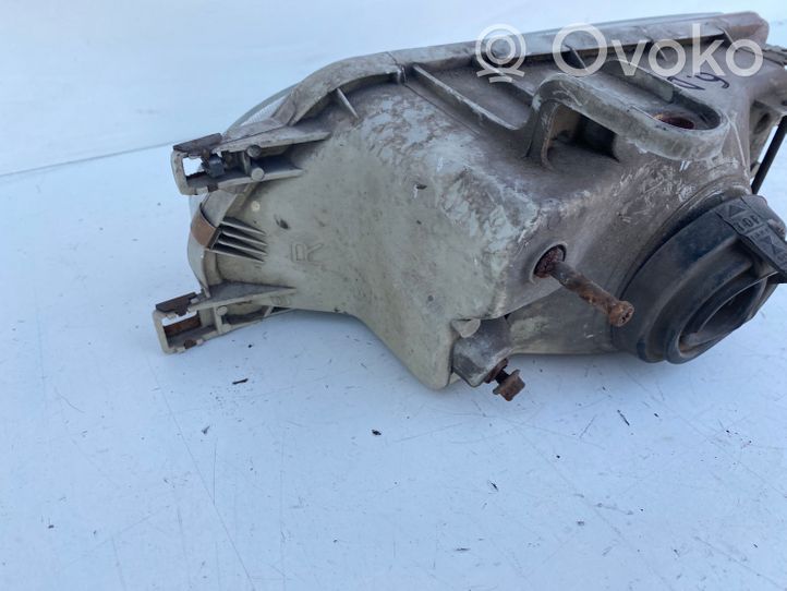 Toyota Corolla E90 Lampa przednia 12307