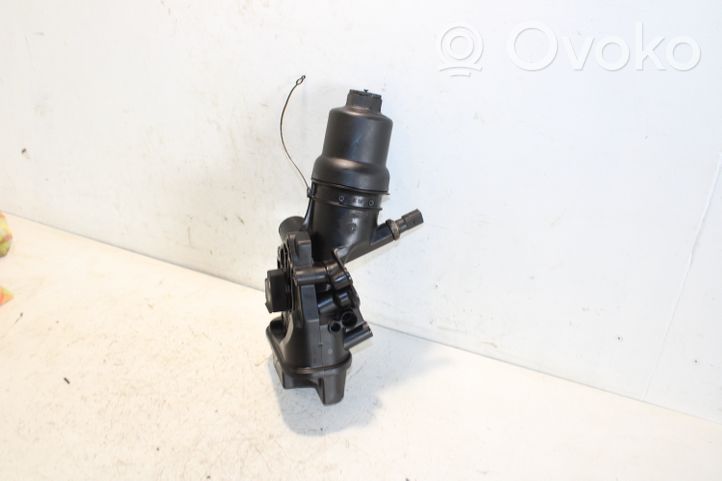 Volkswagen Eos Oil filter mounting bracket 06D115397G