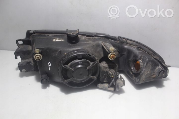 Mitsubishi Carisma Lampa przednia 15157800