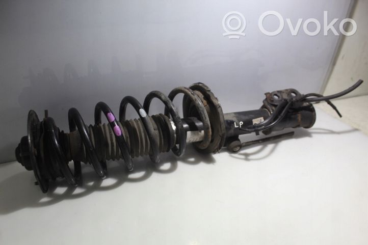 Chevrolet Captiva Front shock absorber with coil spring 