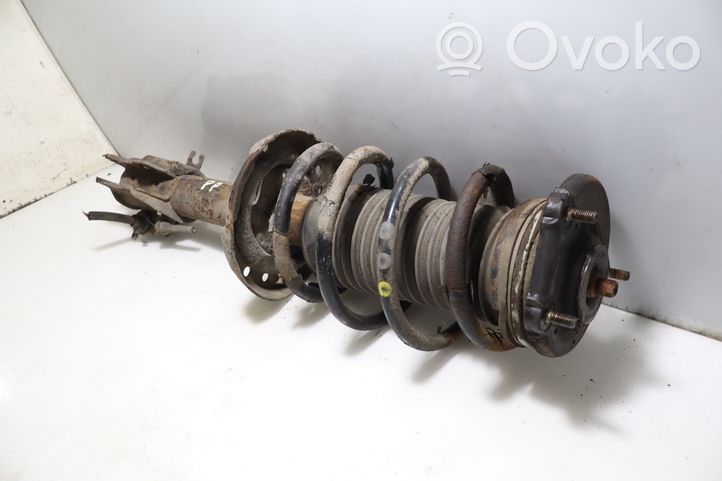 Opel Combo D Front shock absorber with coil spring 