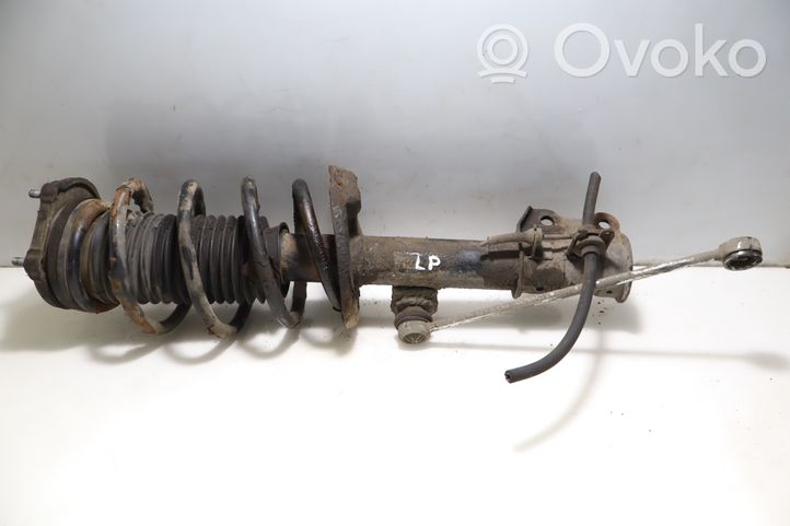 Opel Combo D Front shock absorber with coil spring 