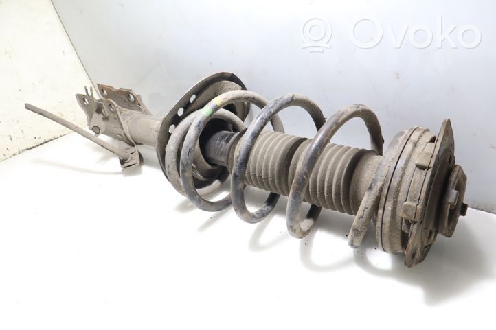 Nissan Qashqai Amortyzator osi przedniej ze sprężyną 824903007907