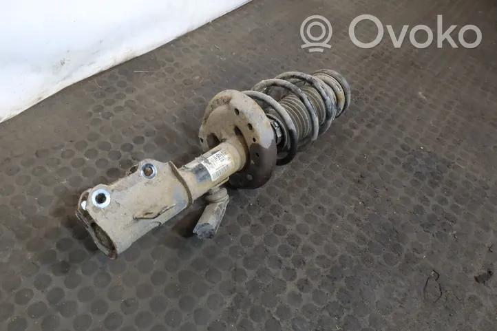 Opel Astra J Front shock absorber with coil spring 