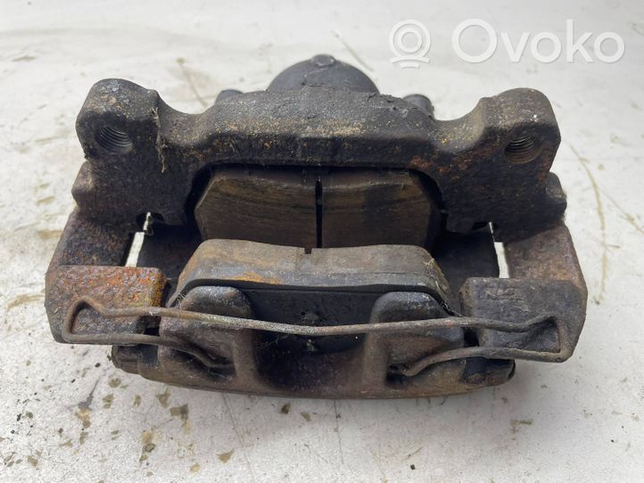 Volkswagen Touran II Front brake caliper 