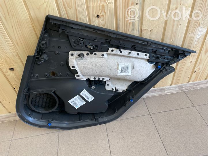 Opel Insignia A Apšuvums aizmugurējām durvīm 00326684