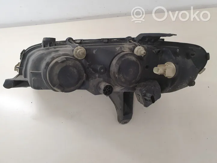 Opel Omega B1 Lampa przednia 90510026